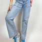 Jeans chiaro con tasconi davanti